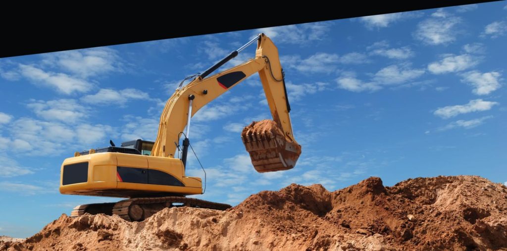 photo of an excavator at a construction site