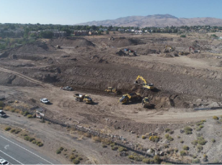 aspen earthworks trucks on an excavation site