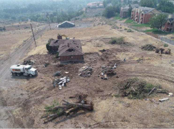 aspen earthworks trucks on an excavation site